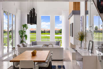 white open plan living and dining room with wood detailing overlooking golf course - Powered by Adobe