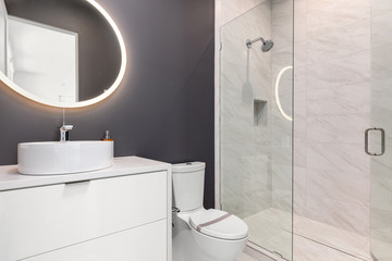 white and grey modern bathroom with sink and shower