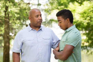 Father and son having a serious conversation.