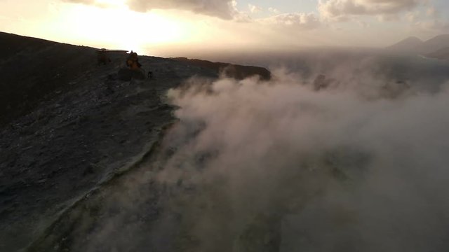 sunset on the crater of Vulcano with sulfur fumaroles, Aeolian Islands, Sicily