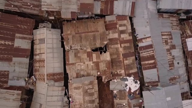 Remarkable aerial shot looking straight down above vast overpopulated slums in Kibera, Nairobi, Kenya, Africa.