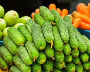 fresh homemade cucumbers on a stacked on a counter
