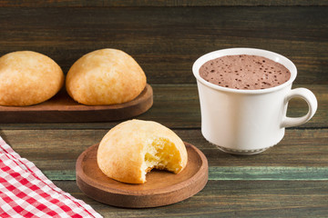 Delicious Almojabana Colombian preparation - Wooden background