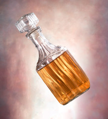 falling whiskey bottle - obrazy, fototapety, plakaty