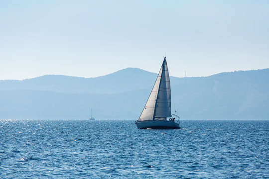 Sailing yacht boat at the Sea. Luxury cruise yachting.