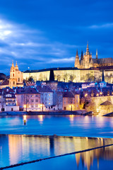 Fototapeta premium night view of Prague castle and Charles bridge over Moldau river, Lesser town, Prague (UNESCO), Czech republic