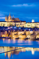 night view of Prague castle and Charles bridge over Moldau river, Lesser town, Prague (UNESCO), Czech republic