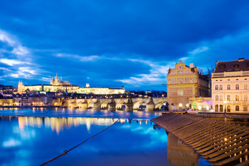 night view of Prague castle and Charles bridge over Moldau river, Lesser town, Prague (UNESCO), Czech republic