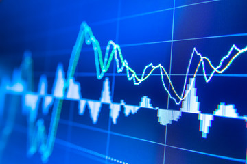 Naklejka premium Stock market graph analysis. Stock market data on LED display on laptop screen for finance and economic. Business graph background.
