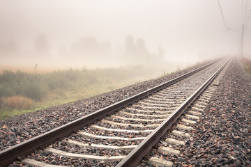 Fototapeta na wymiar Railway in fog