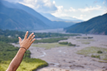 Hand and landscape