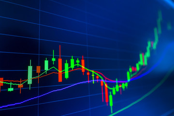 Stock market graph analysis. Stock market data on LED display on laptop screen for finance and economic. Business graph background.