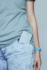 Smartphone in jeans pocket closeup. - 220333161