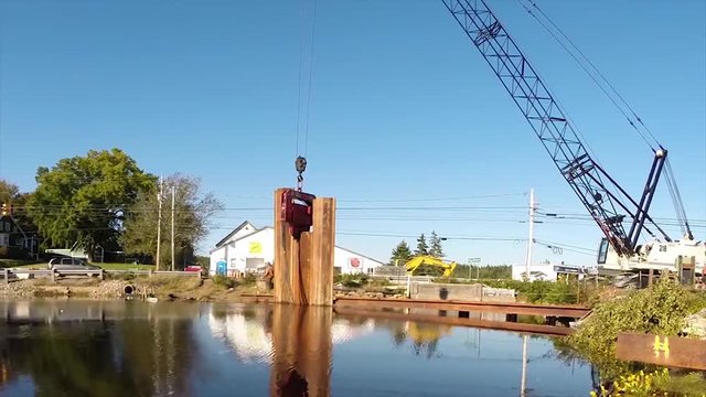 Construction of a cofferdam to keep the water level rising so a new bridge can be built