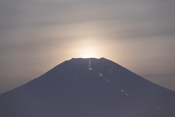 Moon set at top of Mt. Fuji in summer night