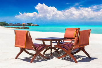Table and chairs in the Maldives