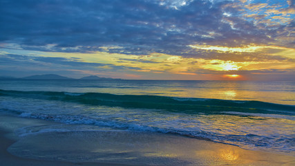 Sea waves and beautiful sunset