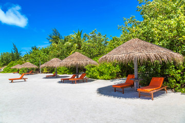 Sunbed and umbrella in the Maldives
