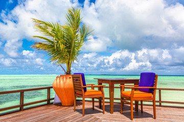 Table and chairs in the Maldives