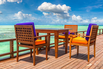Table and chairs in the Maldives