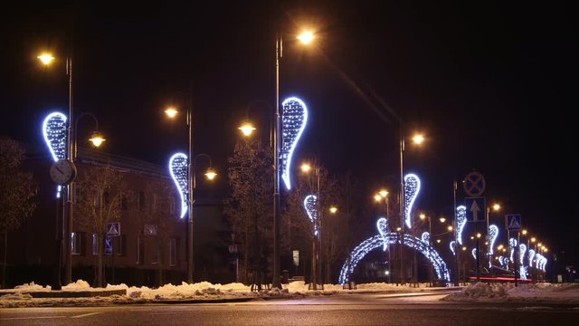 Time Lapse of Christmas Night Traffic in The Decorated Avenue