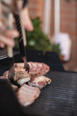 Pork meat cooking on a barbecue