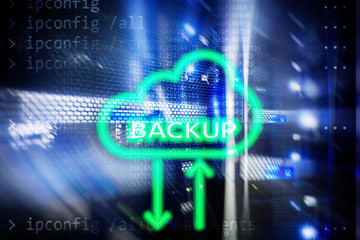 Backup button on modern server room background. Data loss prevention. System recovery.