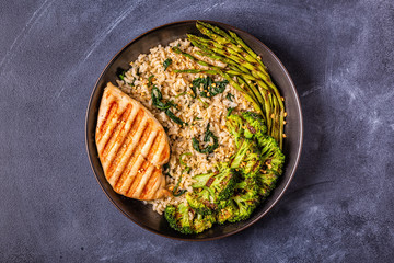 Grilled chicken breast with brown rice, spinach, broccoli, asparagus