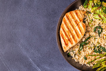 Grilled chicken breast with brown rice, spinach, broccoli, asparagus