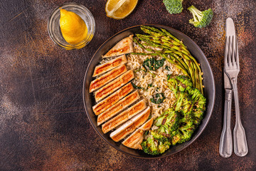 Grilled chicken breast with brown rice, spinach, broccoli, asparagus