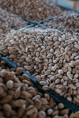 Obraz premium Fresh nuts and dried fruit at the bazaar in Osh, Kyrgyzstan 