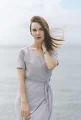 Portrait of pensive young woman.