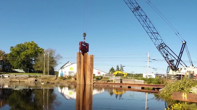 Construction of a cofferdam to keep the water level rising so a new bridge can be built