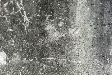 old concrete wall with traces of destruction and mold