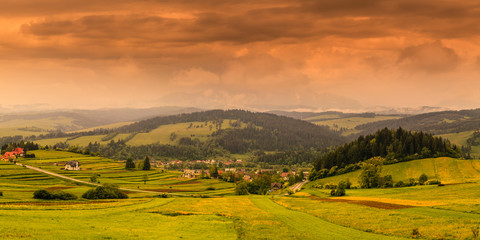Pieniny Panorama with a view of the Tatras at sunrise.