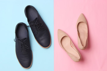 modern fashionable classic shoes, men's and women's shoes on a colored background top view.