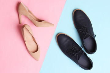 modern fashionable classic shoes, men's and women's shoes on a colored background top view. - obrazy, fototapety, plakaty