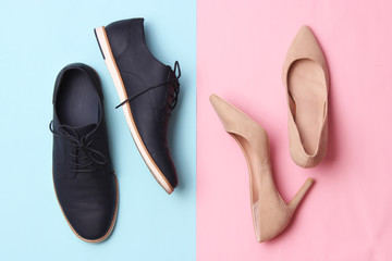 modern fashionable classic shoes, men's and women's shoes on a colored background top view.