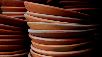 Brown dish earthenware in old pottery village on koh kret island Thailand