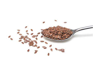 Brown flaxseeds  on white background - isolated