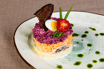 Russian traditional salad with herring