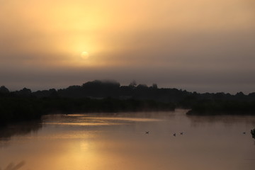 Obraz na płótnie Canvas coucher de soleil sur le domaine de certes bassin d'arcachon