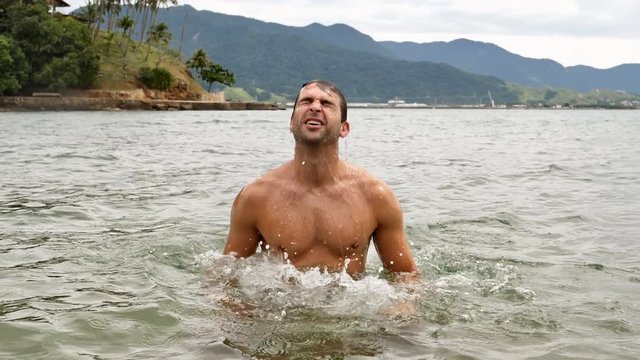 Dude emerging from sea