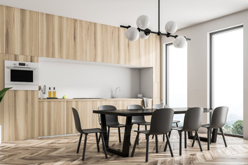 Fototapeta premium Wooden kitchen corner, black table