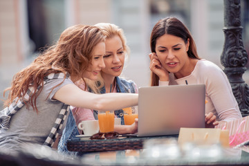 Friends having a great time in cafe