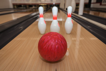 The bowling ball is ready to strike