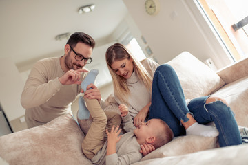 Obraz premium Happy family enjoying at home