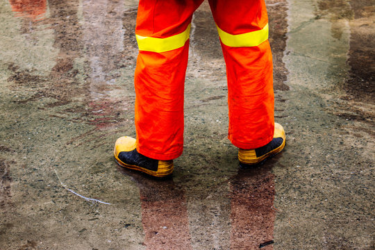 fireman in protective boots and pants