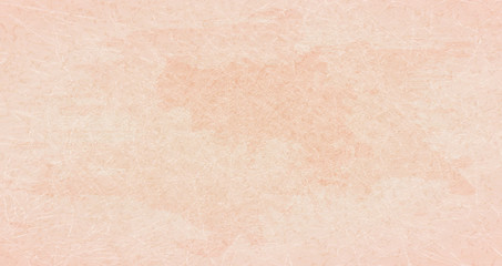 Beige scratched background with spots of paint.