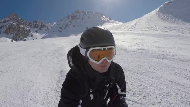 Skier On Alpine Skiing Accelerates Quickly On The Ski Slopes In The Mountains